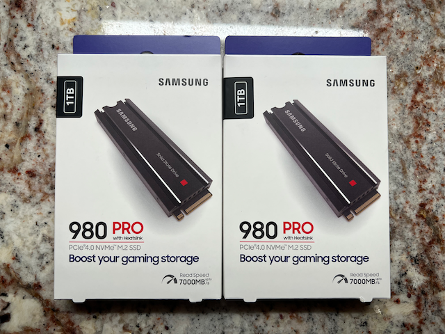 Two 1TB Samsung 980 PRO NVMe drives in boxes