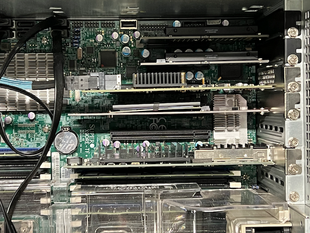 Photo of main board PCIe slots, showing the cards reinserted