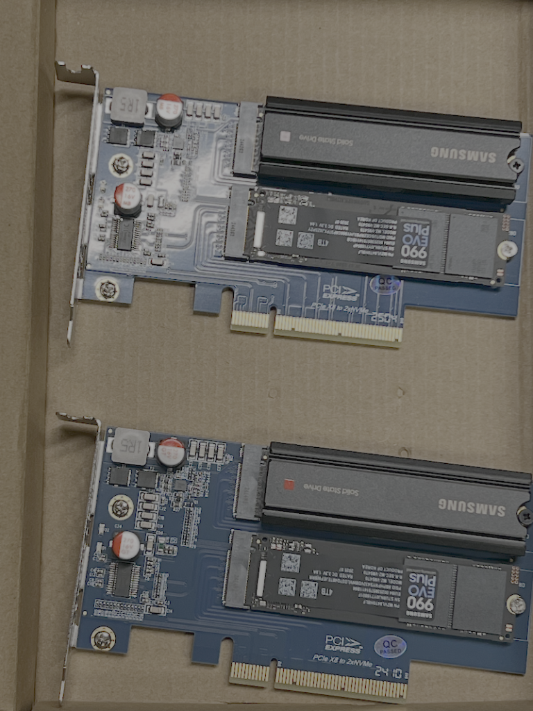 A 1TB and a 4TB NVMe card on each PCIe adaptor.