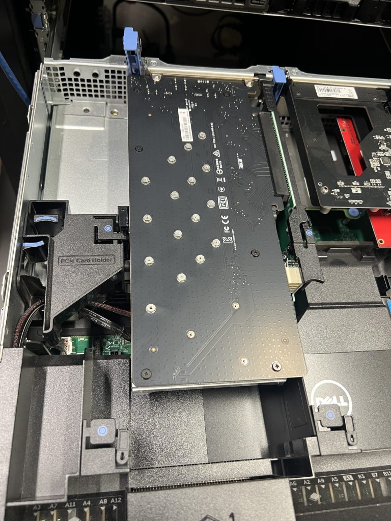 This 4x NVMe card had to be removed in order to access the SATA ports. Getting the PCIe Card Holder out required looking up the docs. That was rough. Also, watch for that clip just below the PCIe slot.