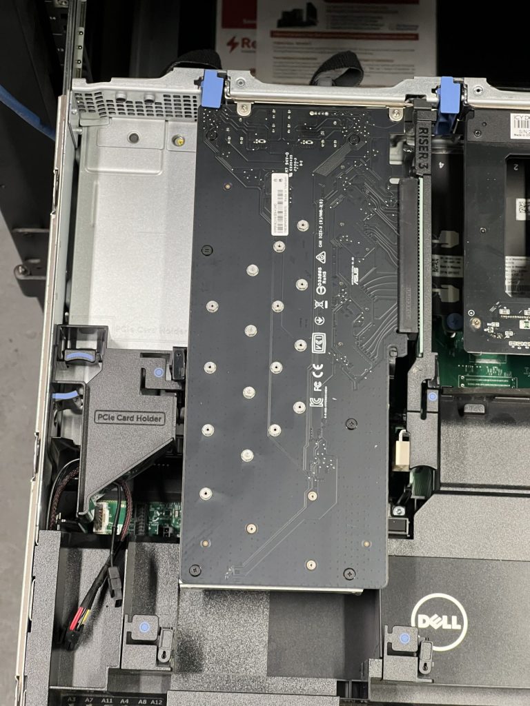 The 4x NVMe card has been reinstalled. Notice how the cables have been routed in an arch through the PCIe Card Holder.